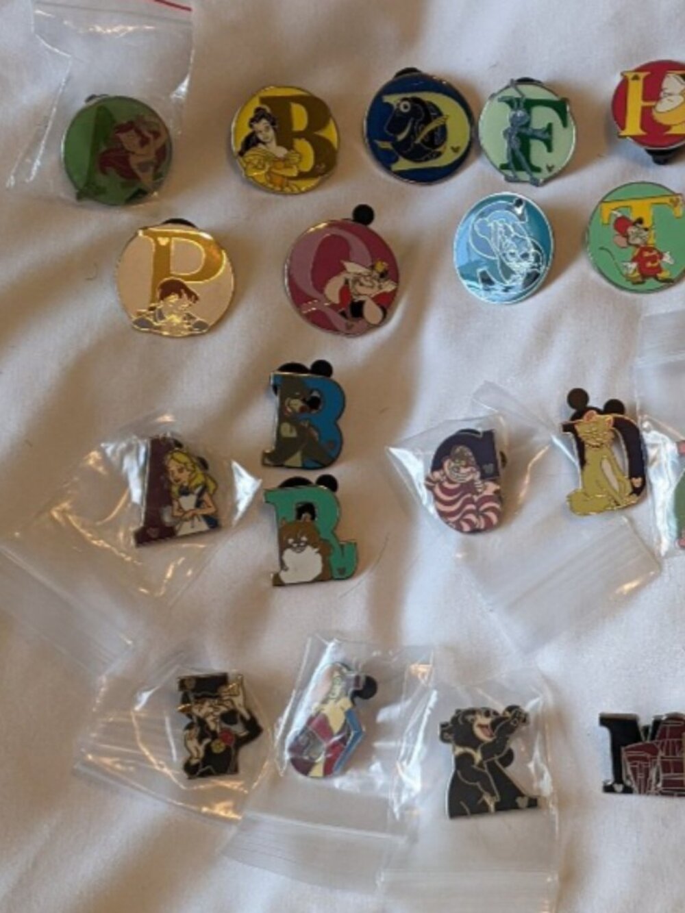 Disney Alphabet Pins Two (2) INCOMPLETE sets -see pictures